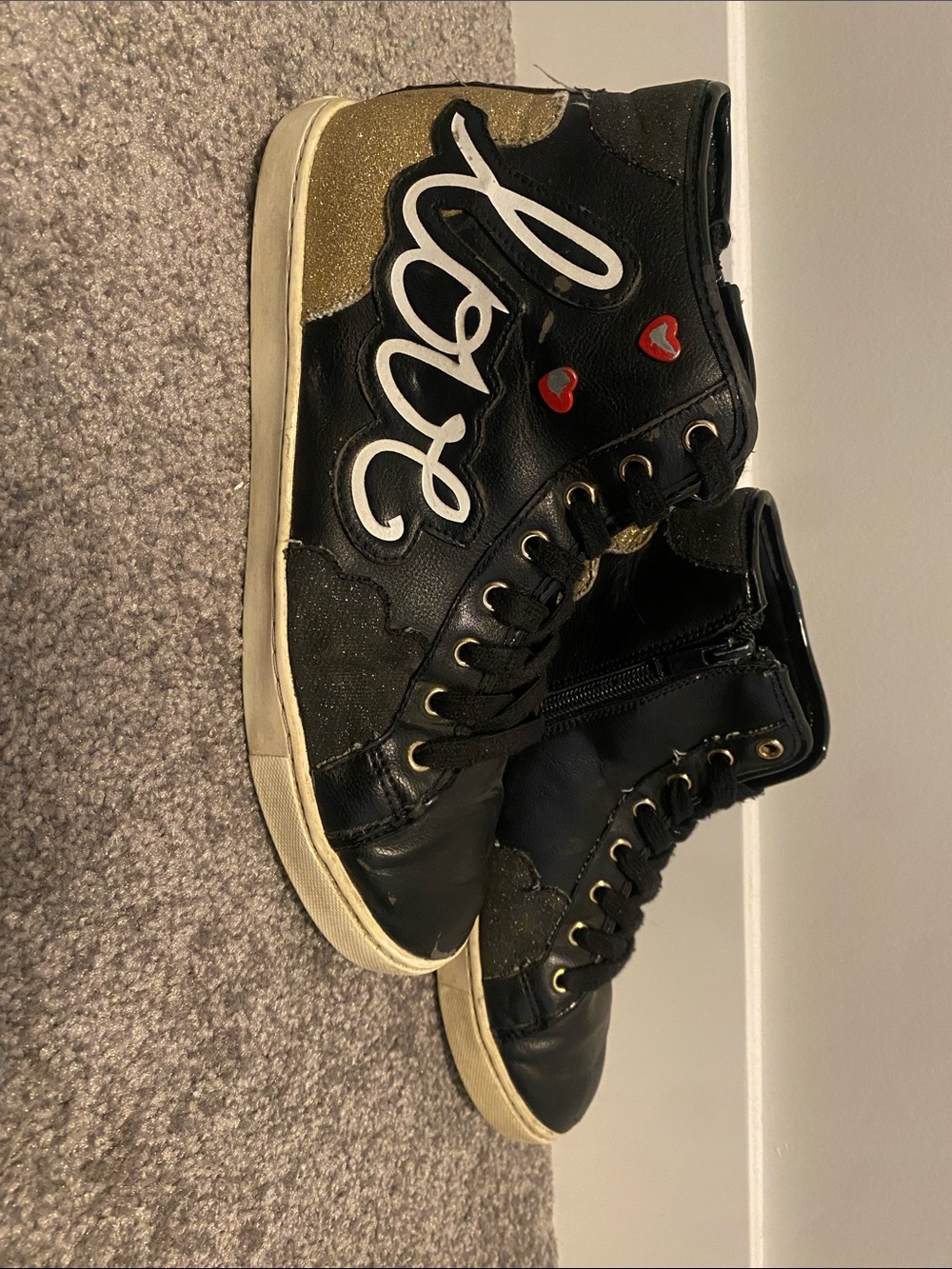 Aldo Black and Gold High-Top Sneakers with Red Heart Accents